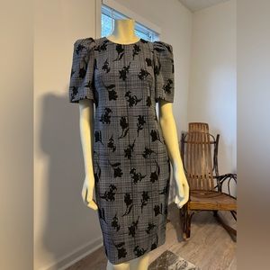 Ladies black,gray and white Calvin Klein dress size 8 with hold zipper